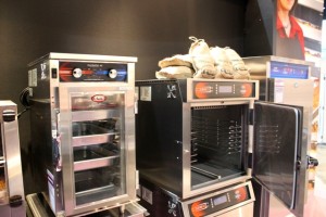 Smoker Ovens and Heated Holding Cabinets being prepped for Cooking at the Show