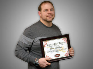 Dave Vanderlee holding his Extra Mile Award!