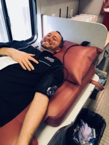 American Red Cross FWE Blood Drive, FWE's National Sales Manager Travis Hartley shown donating blood.